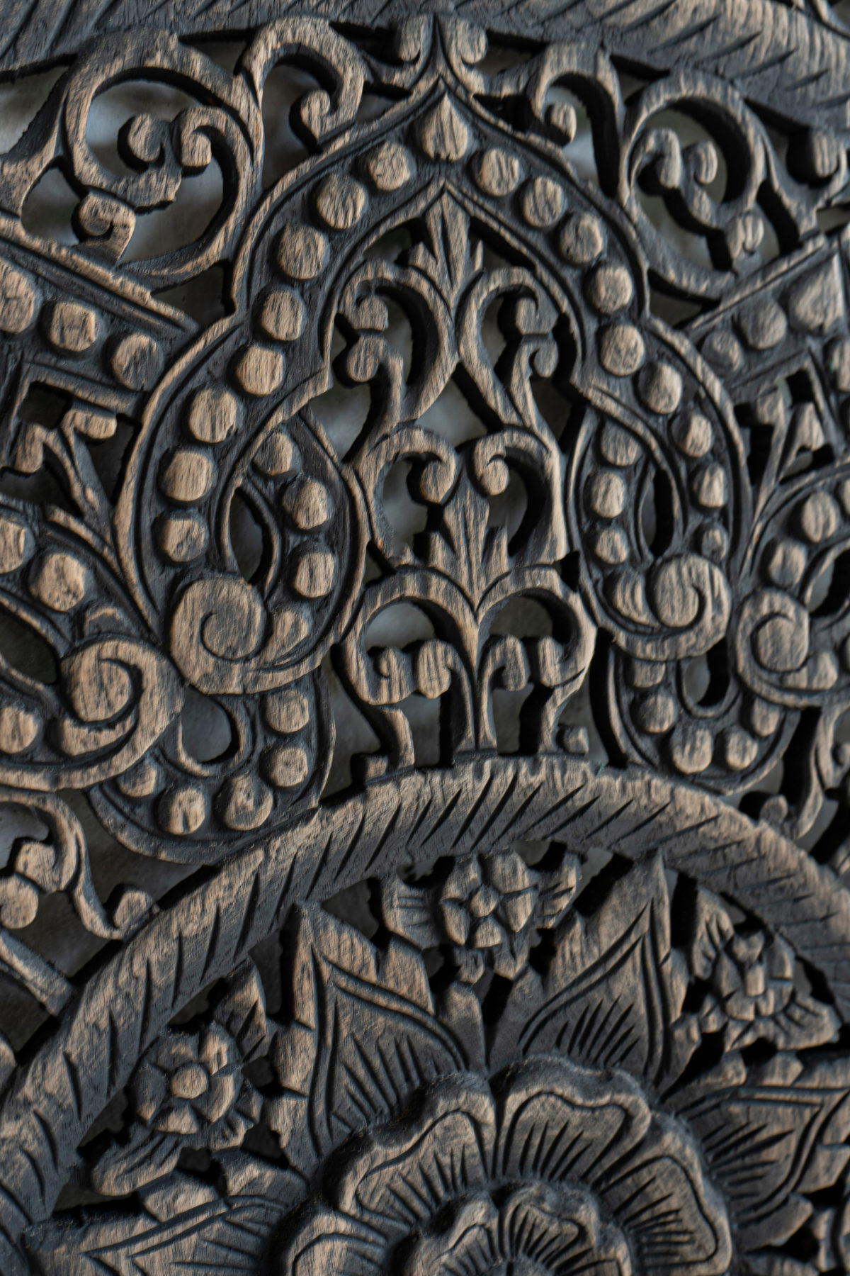 Black mandala wood carving