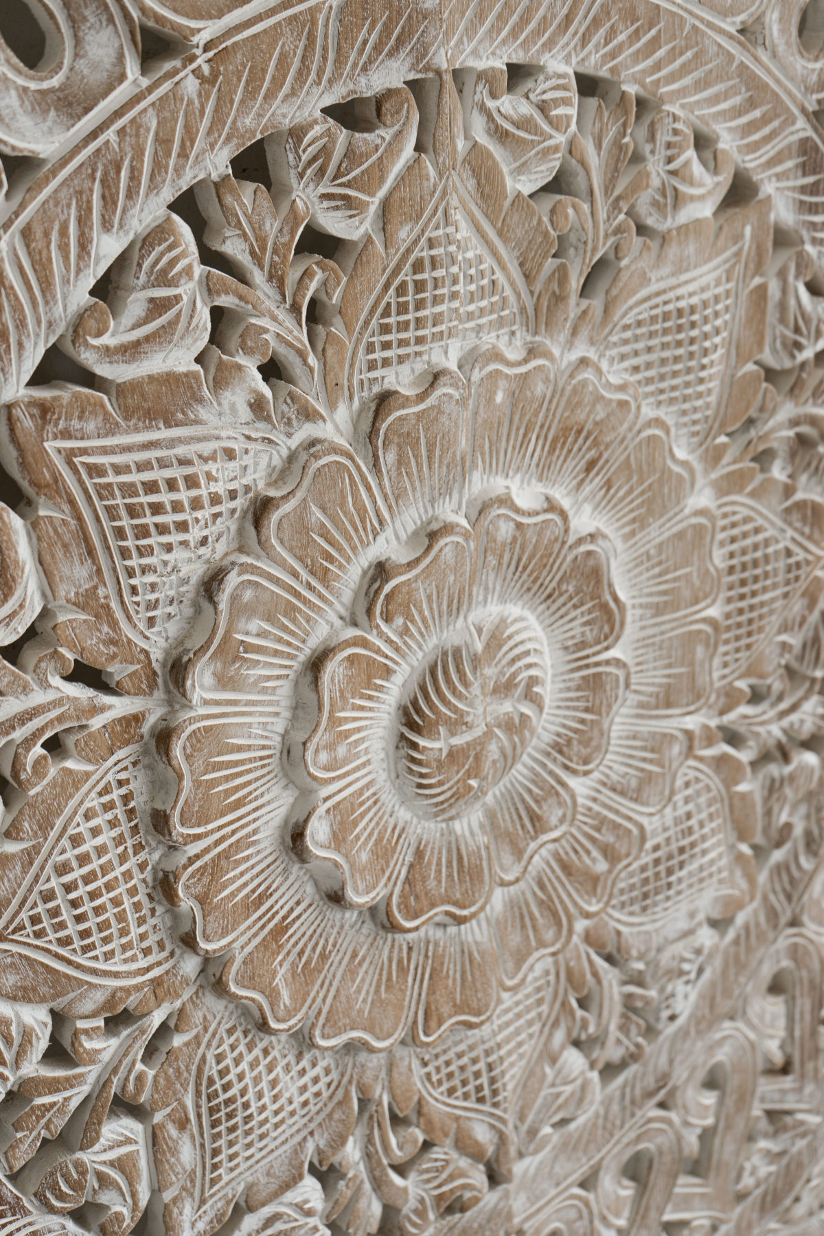 Asian mandala carved in wood