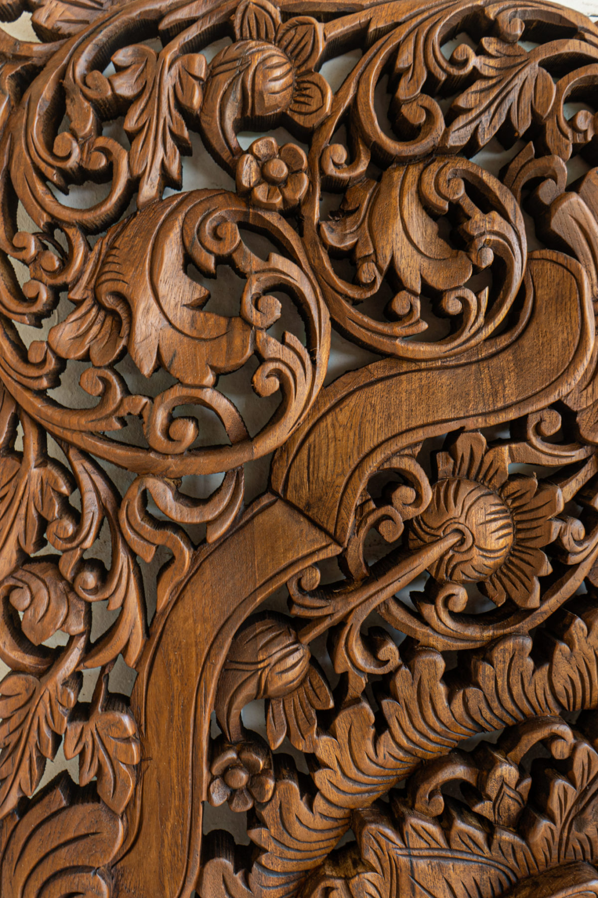 Sculpted wood carving in teak