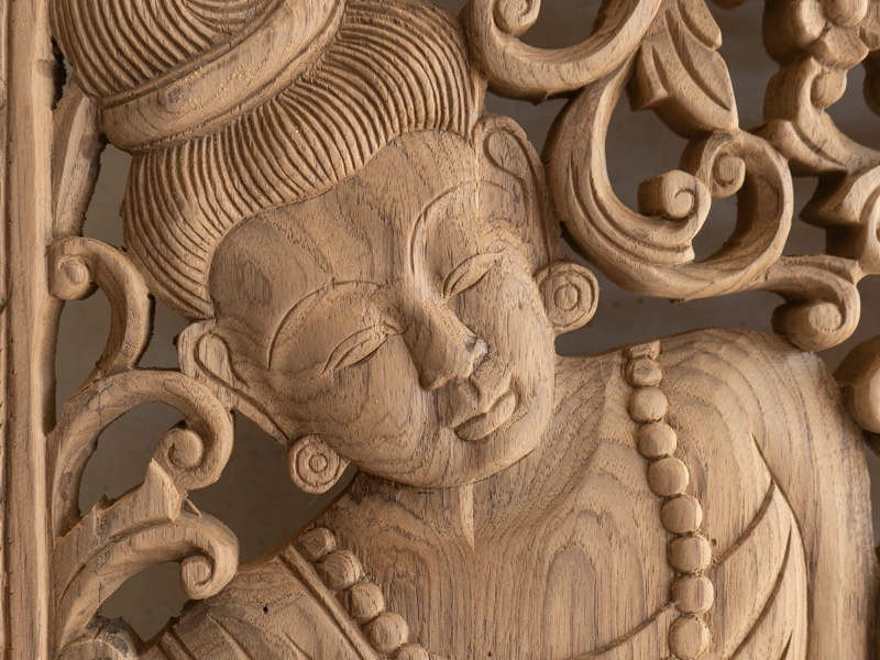 Asian wood carving figurine in reclaimed teak