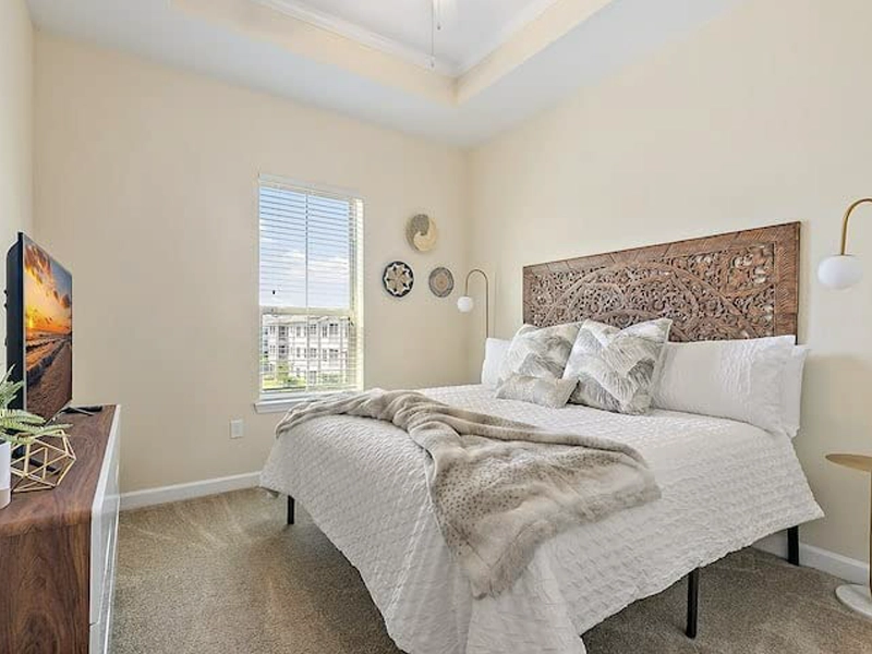 Elegant wood carved king size bed headboard in teak