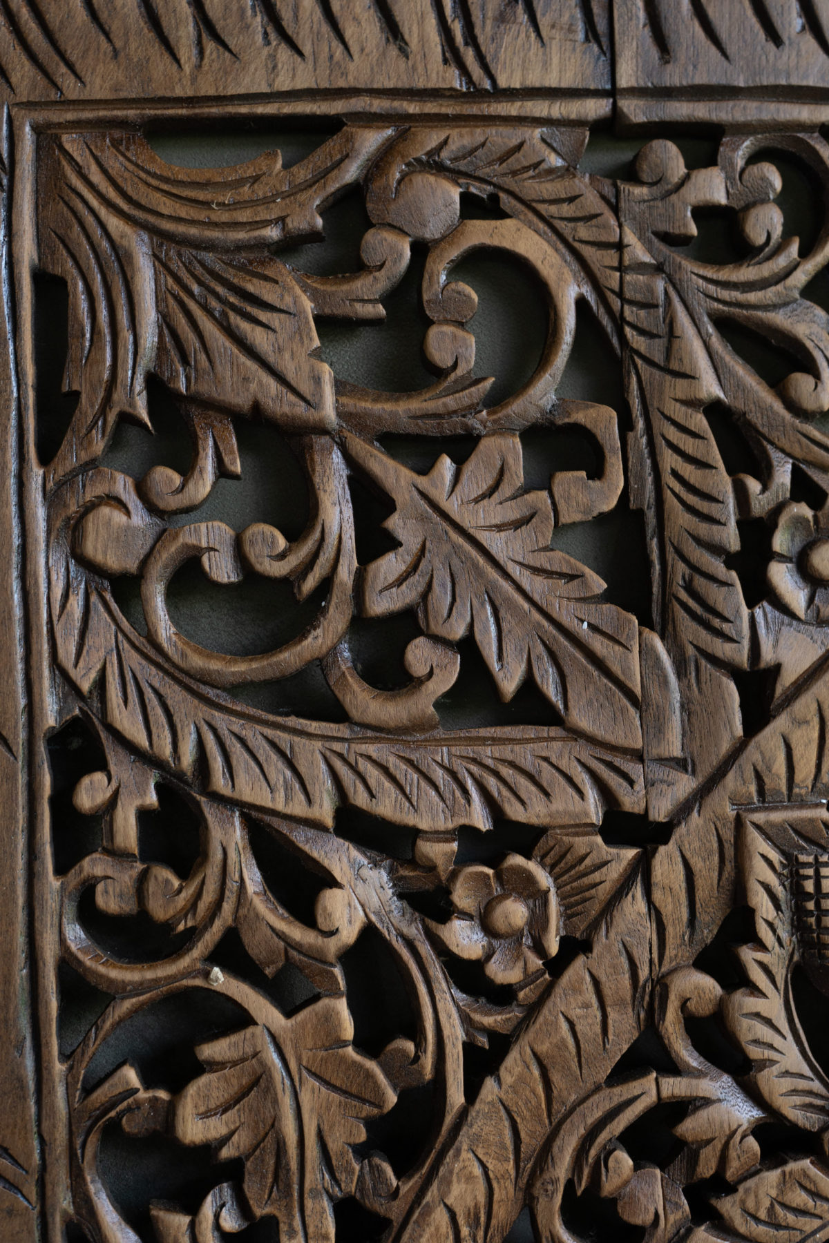 Dark wood stain carving