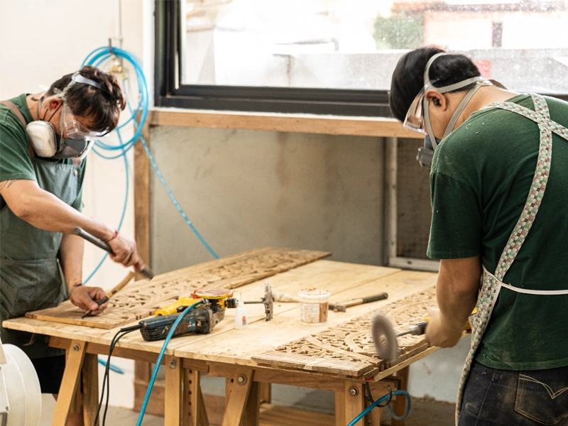 Wood worker from Thailand skilled in carving