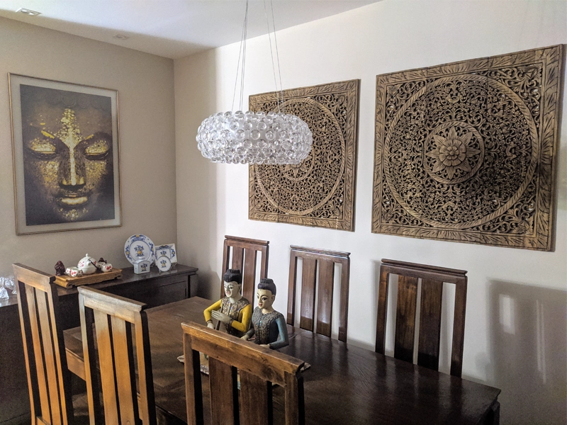 Hand-carved wood wall art hanging in teak wood