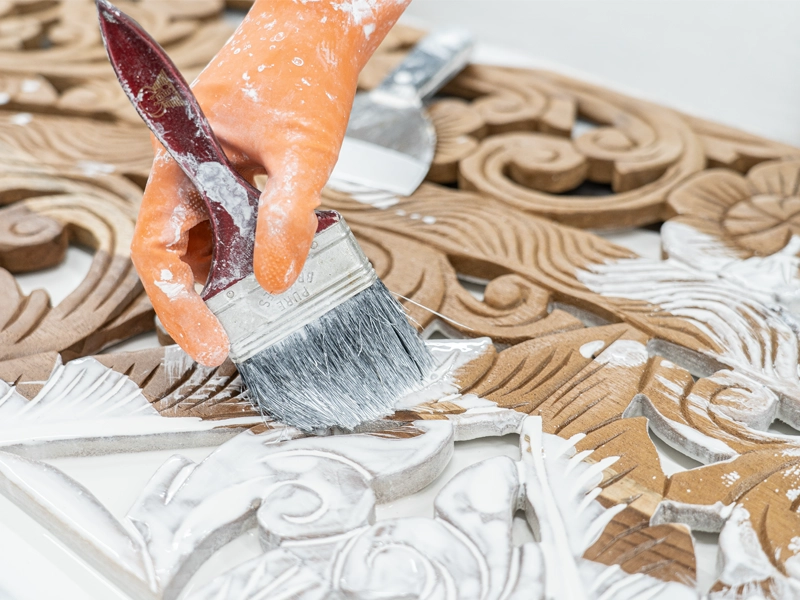 Close up details of wood carved painted in white