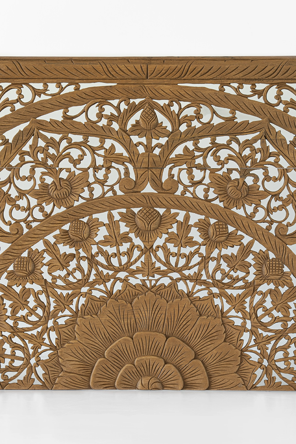 Hand-carved-half-headboard-in-california-king-brown-stain-3 Close-up of central Thai mandala carving on reclaimed teak headboard