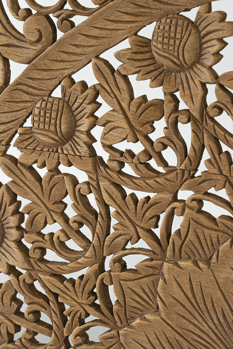 Hand-carved-half-headboard-in-california-king-brown-stain-4 Macro view of hand-carved floral details on reclaimed teak wood.