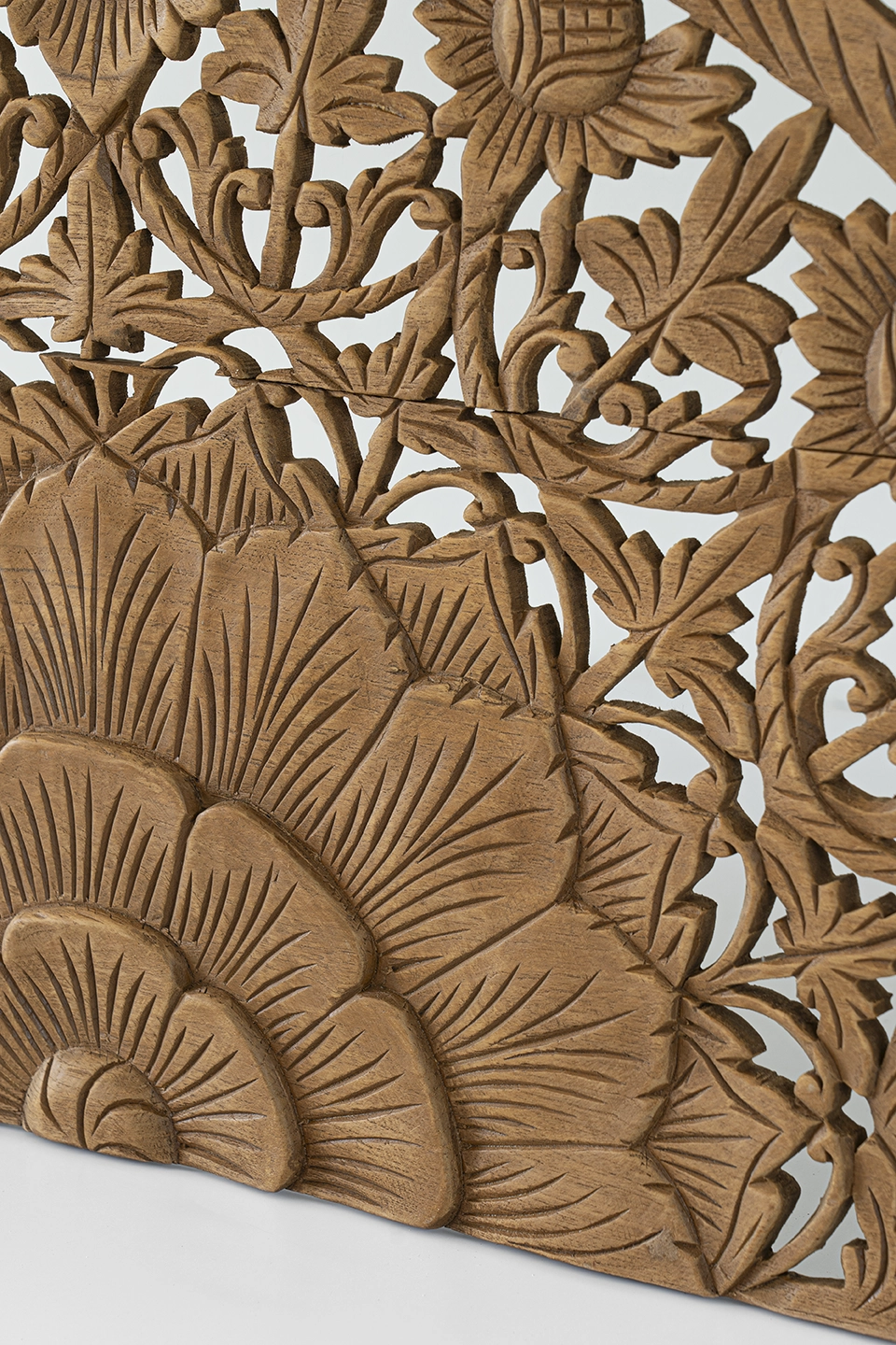 Hand-carved-half-headboard-in-california-king-brown-stain-5 Close-up of mandala petal carving on brown-stained reclaimed teak.