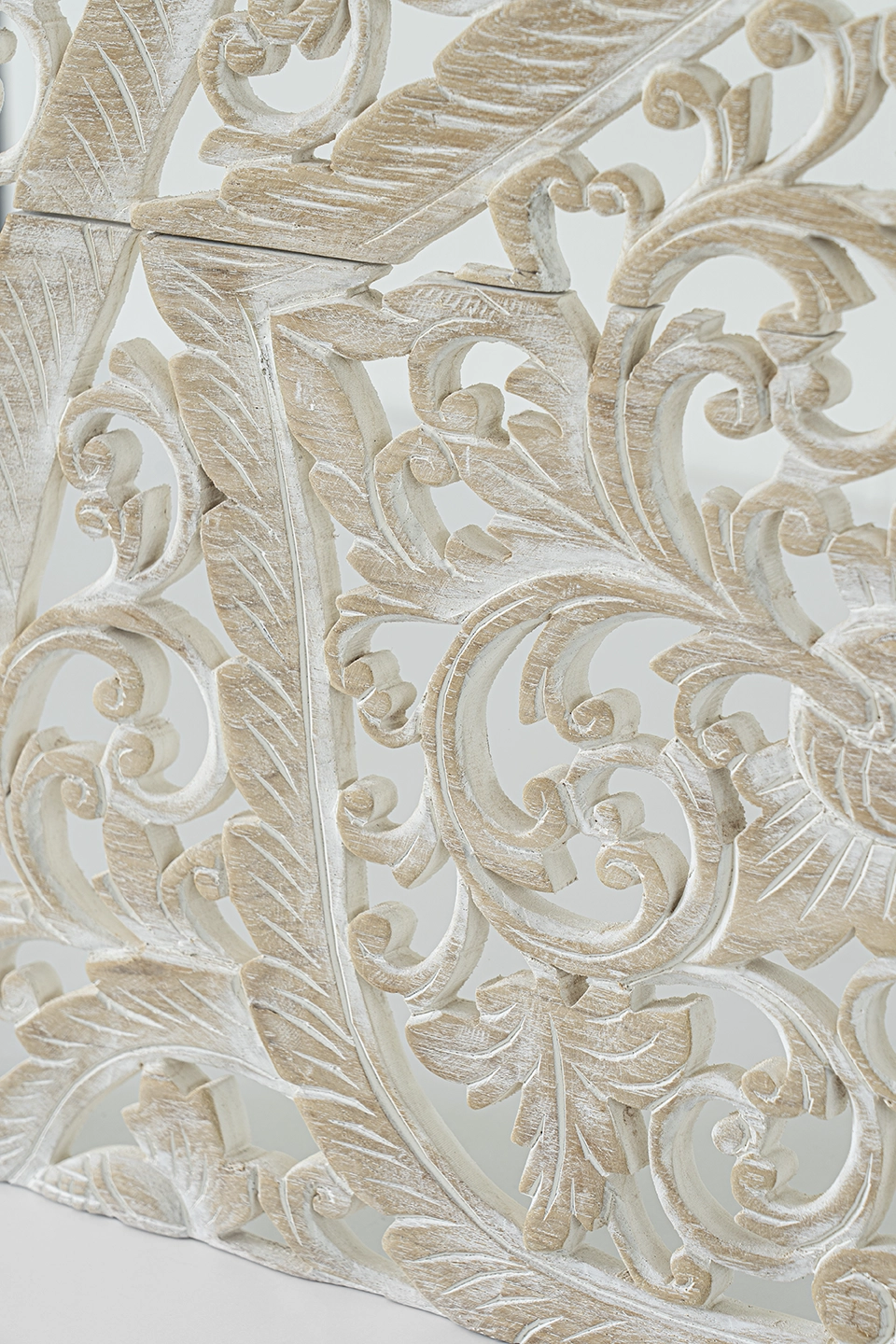 Whitewash-mandala-wood-carving-for-california-kingsize-headboard-5 Close-up of floral and vine carvings with whitewash finish on reclaimed teak.